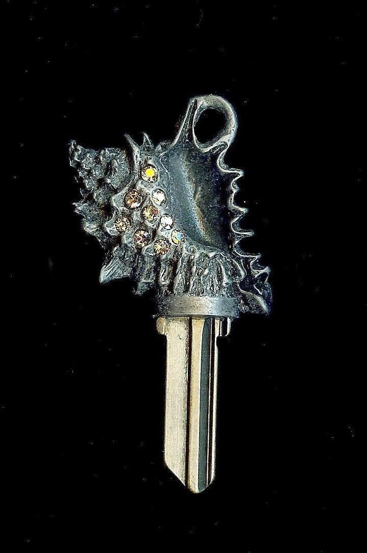 conch shell key blank – KeysToMyCastle